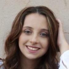 Tutor Helping Students Find Their Voice Through Reading and Writing